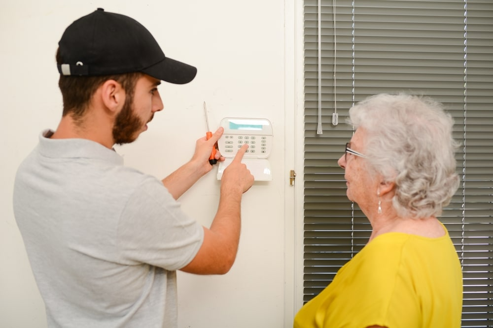 A Handled specialist assessing a home room by room